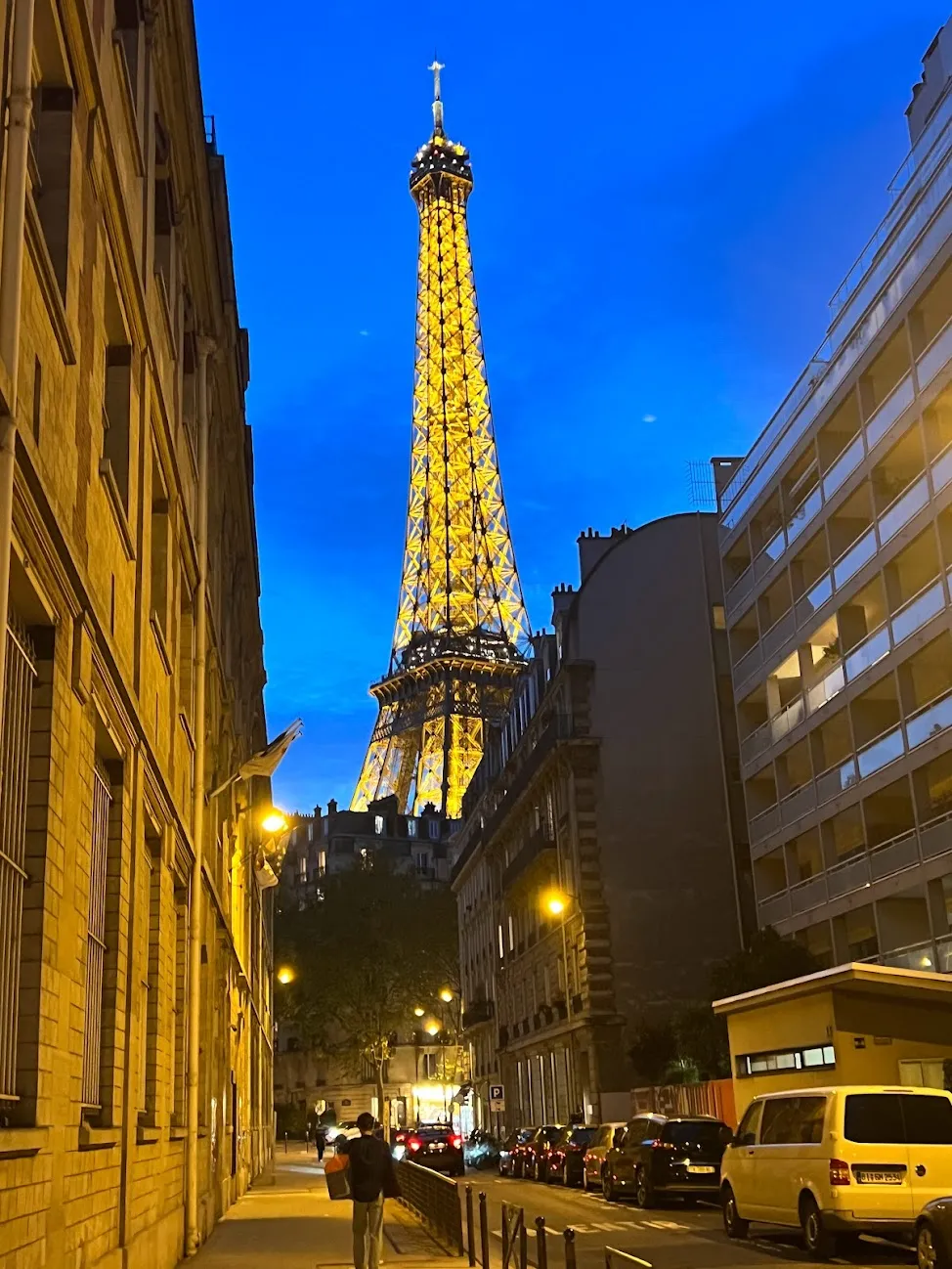 Eiffel Tower lit up during blue hour